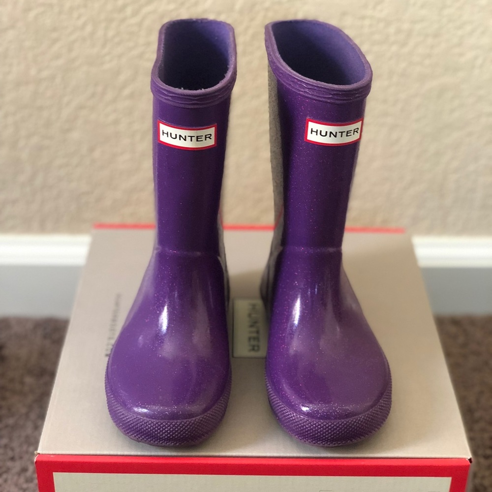 Hunter kids (US 10/UK 9) rain boots.  Acid purple color.